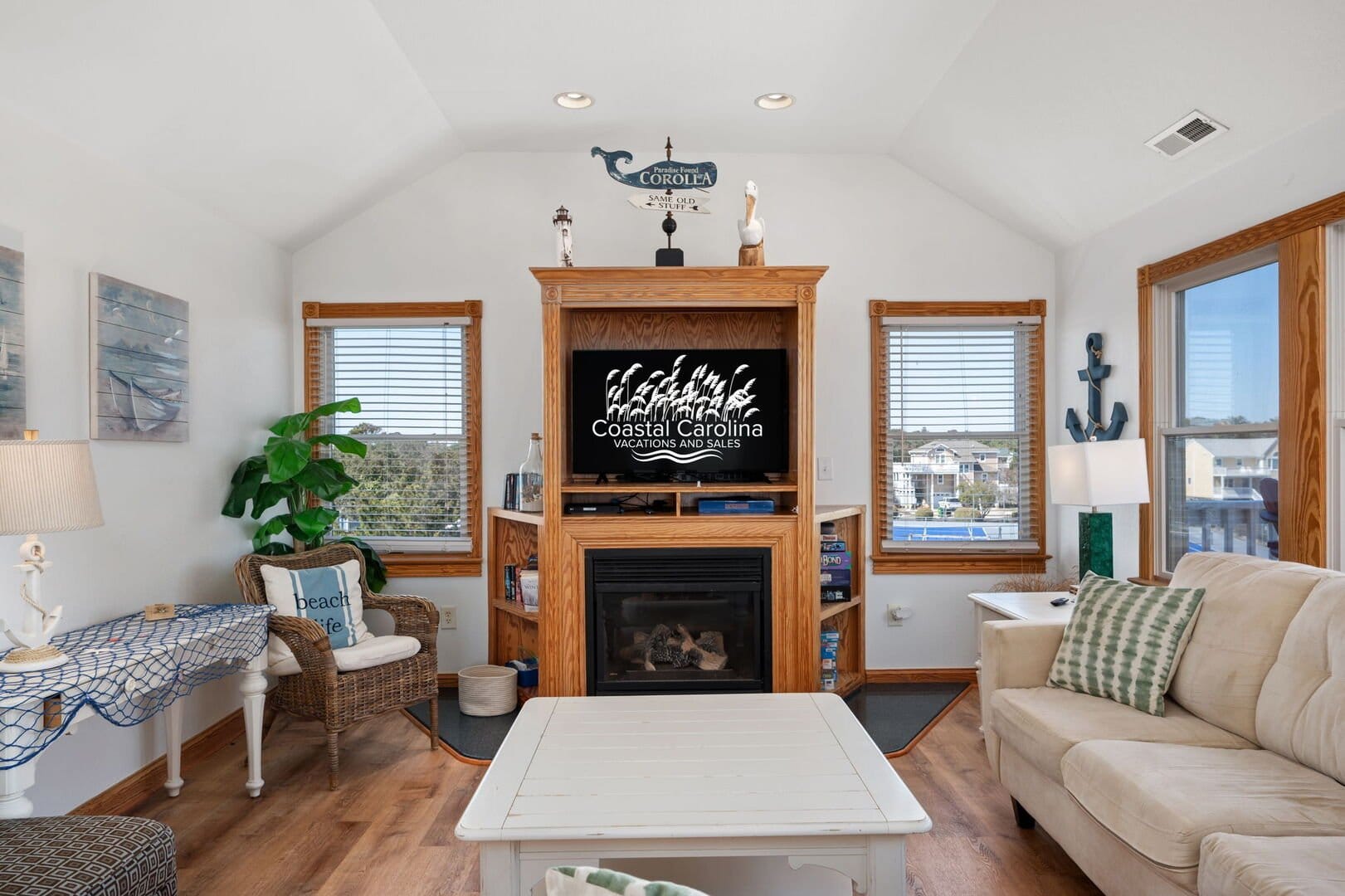 Coastal-themed living room with decor.