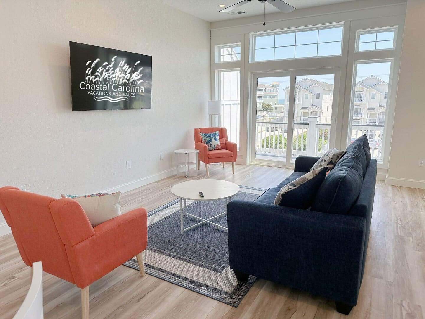 Bright living room with balcony view.