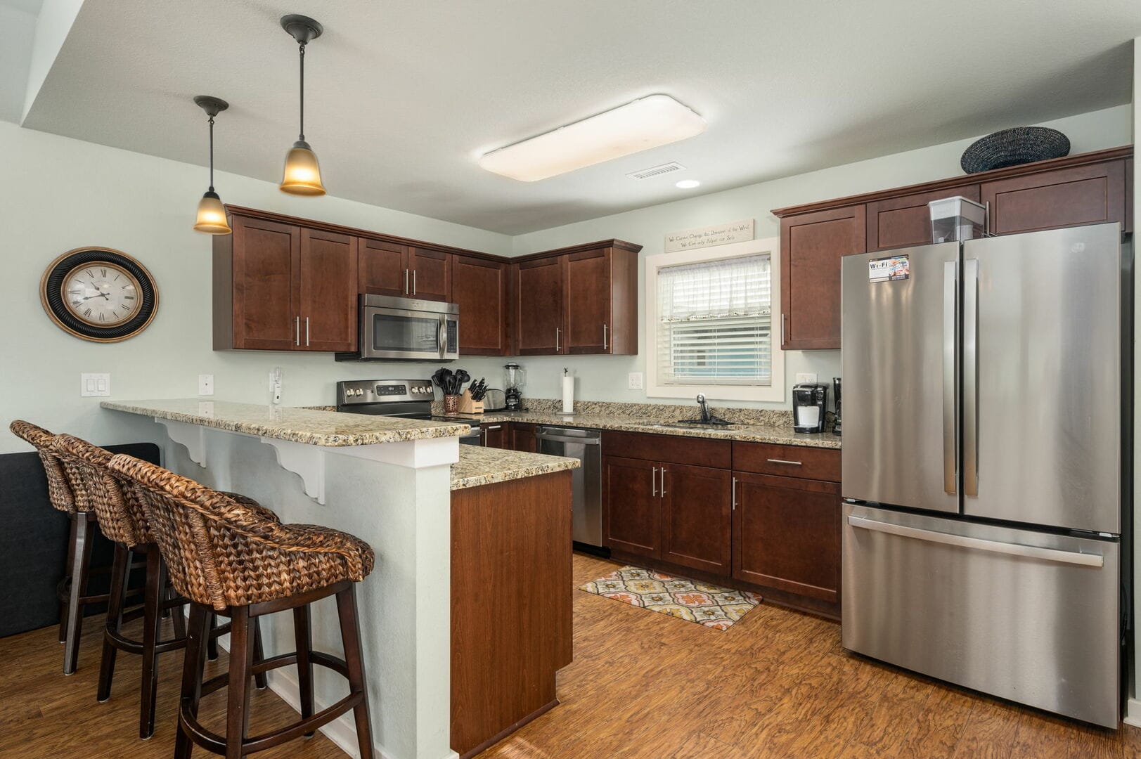 Modern kitchen with bar stools.