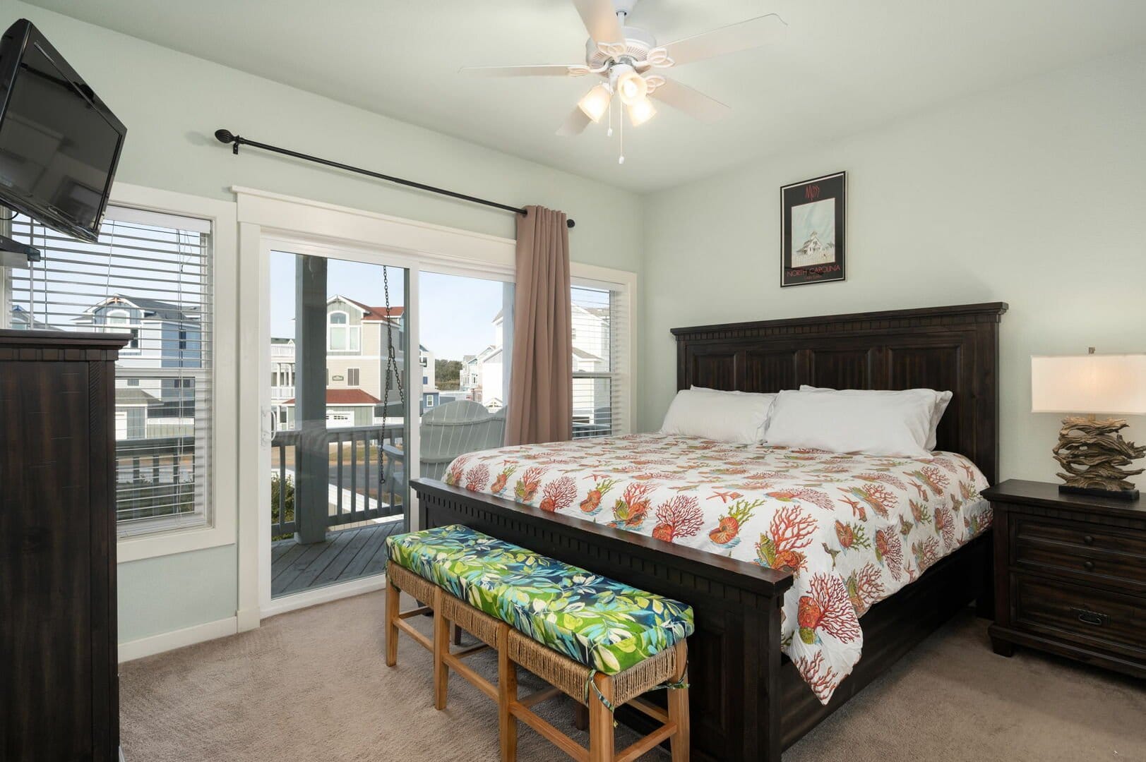 Cozy bedroom with large window.