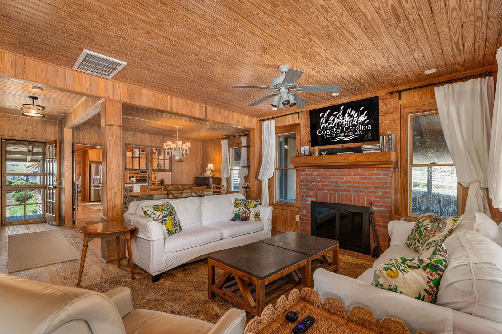 Cozy wood-paneled living room.