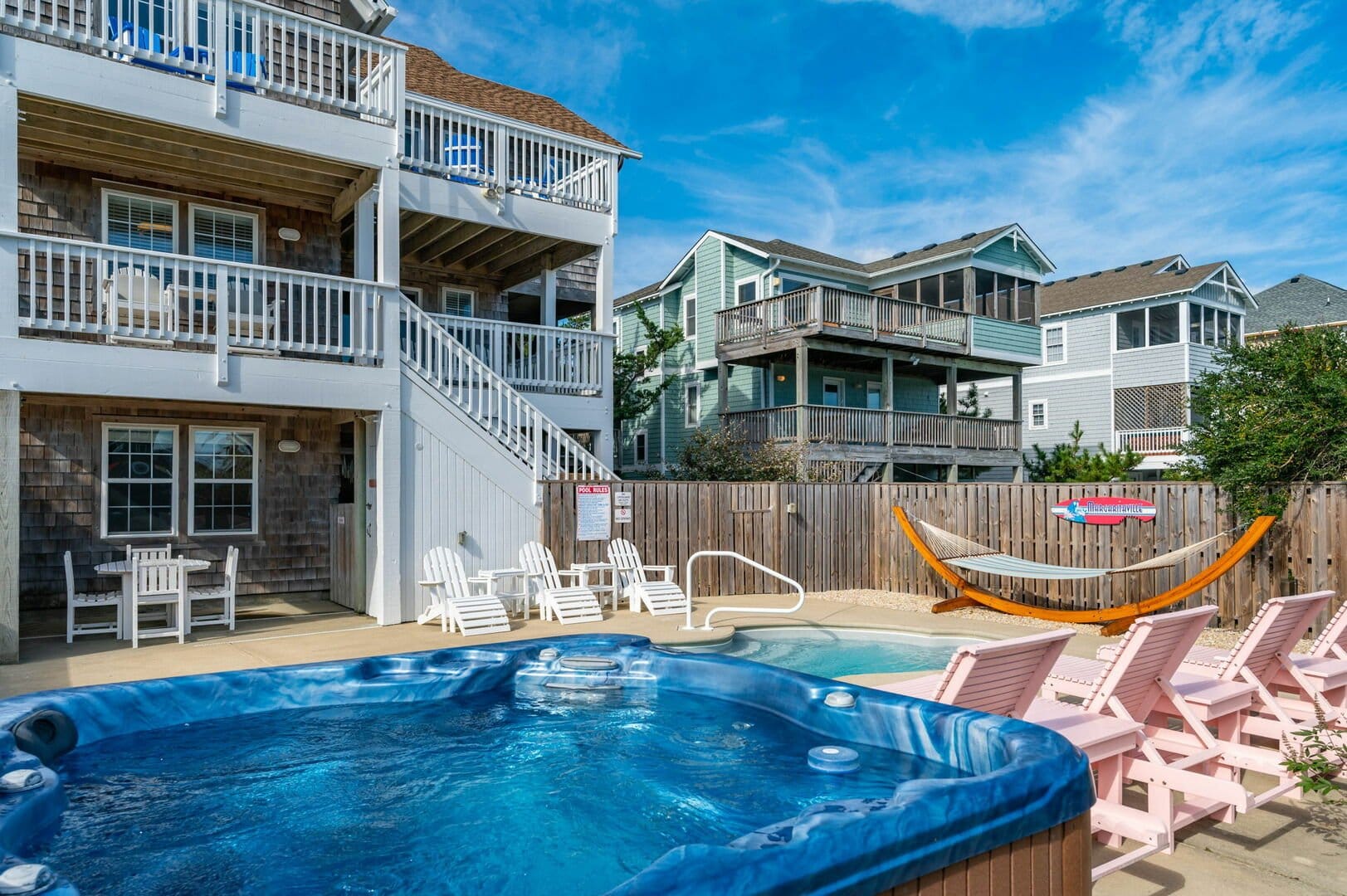 Outdoor hot tub, pool, beach house.