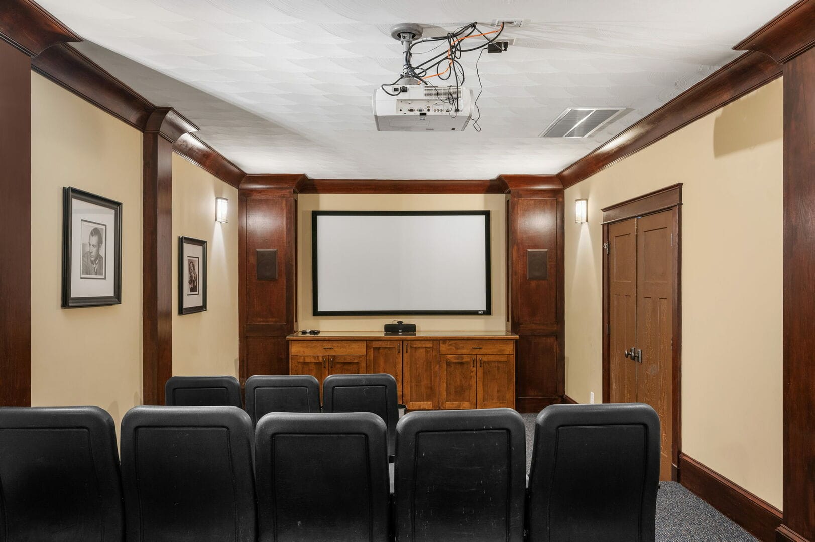 Home theater with projector screen.