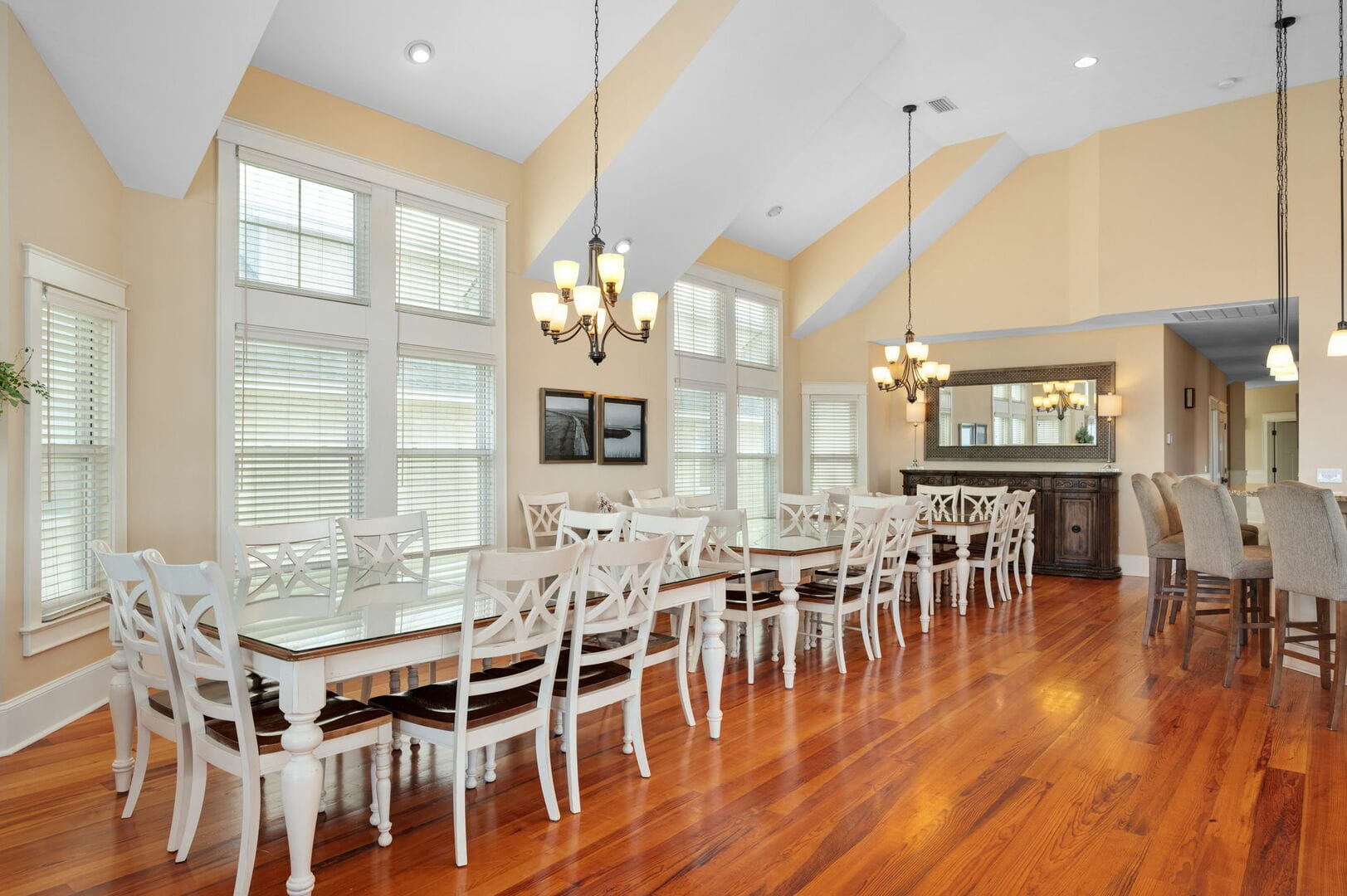 Elegant dining room with large tables.