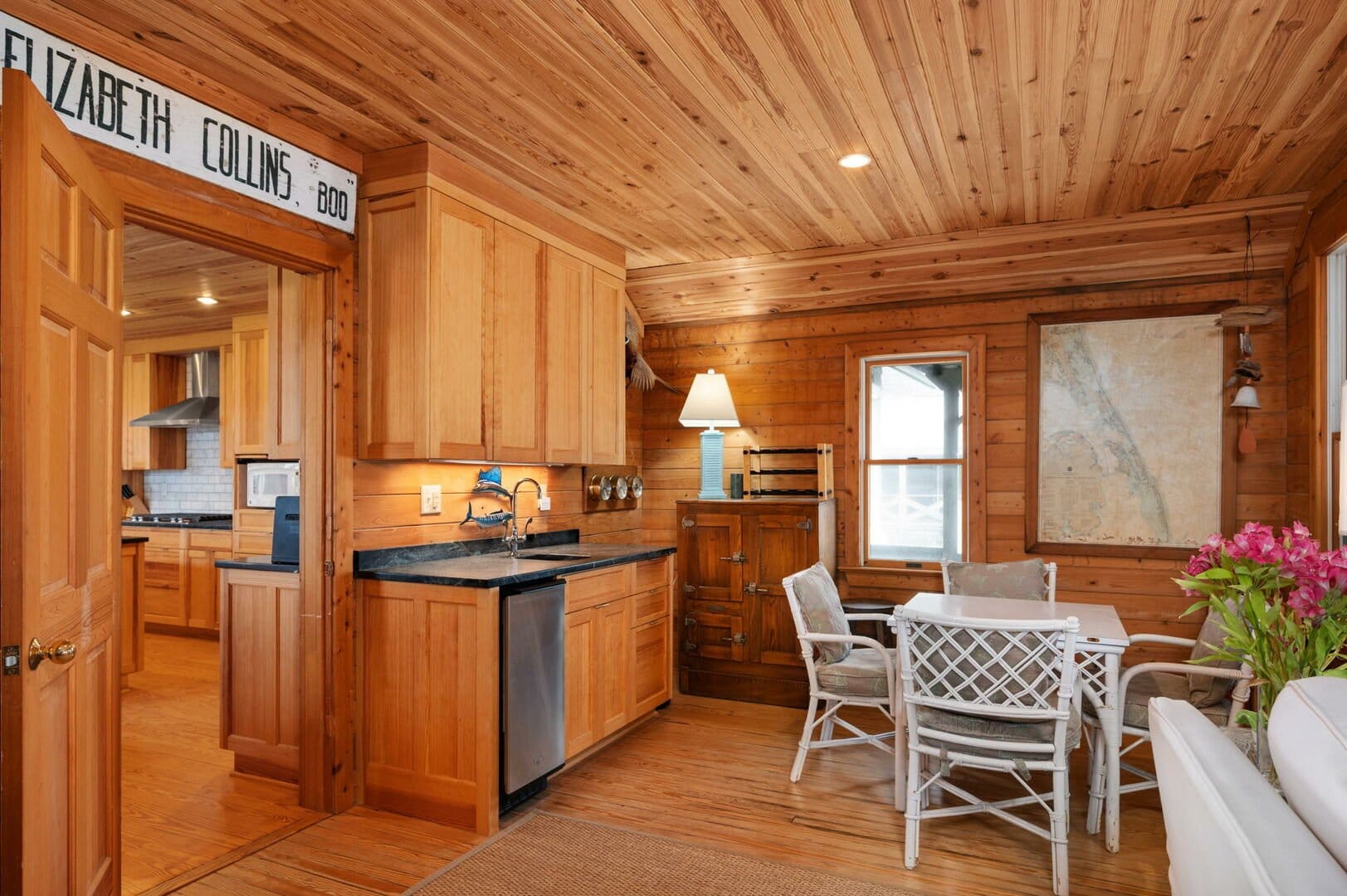 Cozy wooden kitchen and dining area.