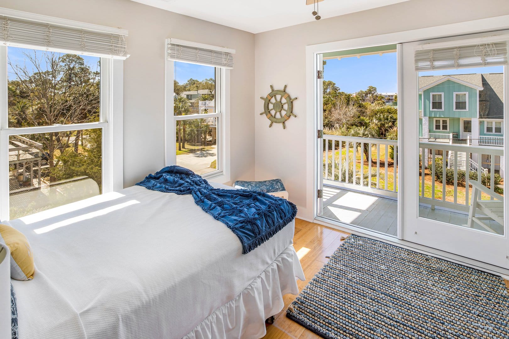 Cozy bedroom with balcony view.