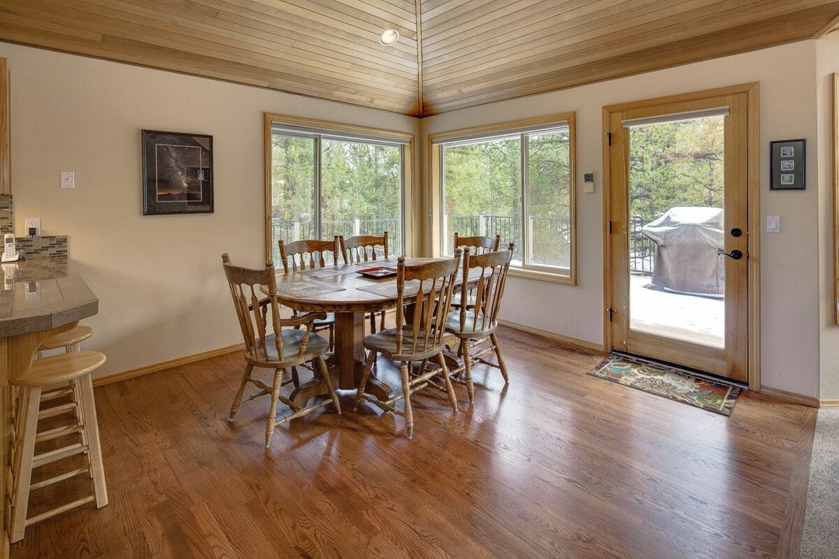 Dining area with wooden table.