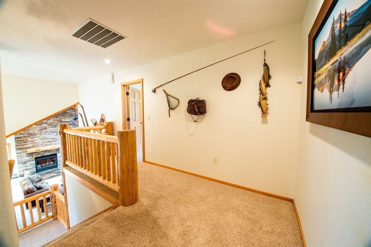 Rustic hallway with fishing decor.