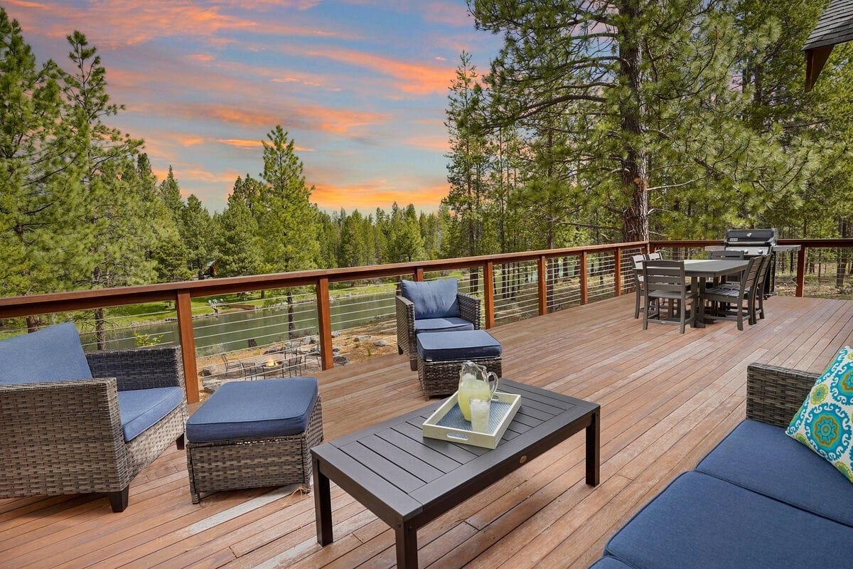 Wooden deck with outdoor furniture.