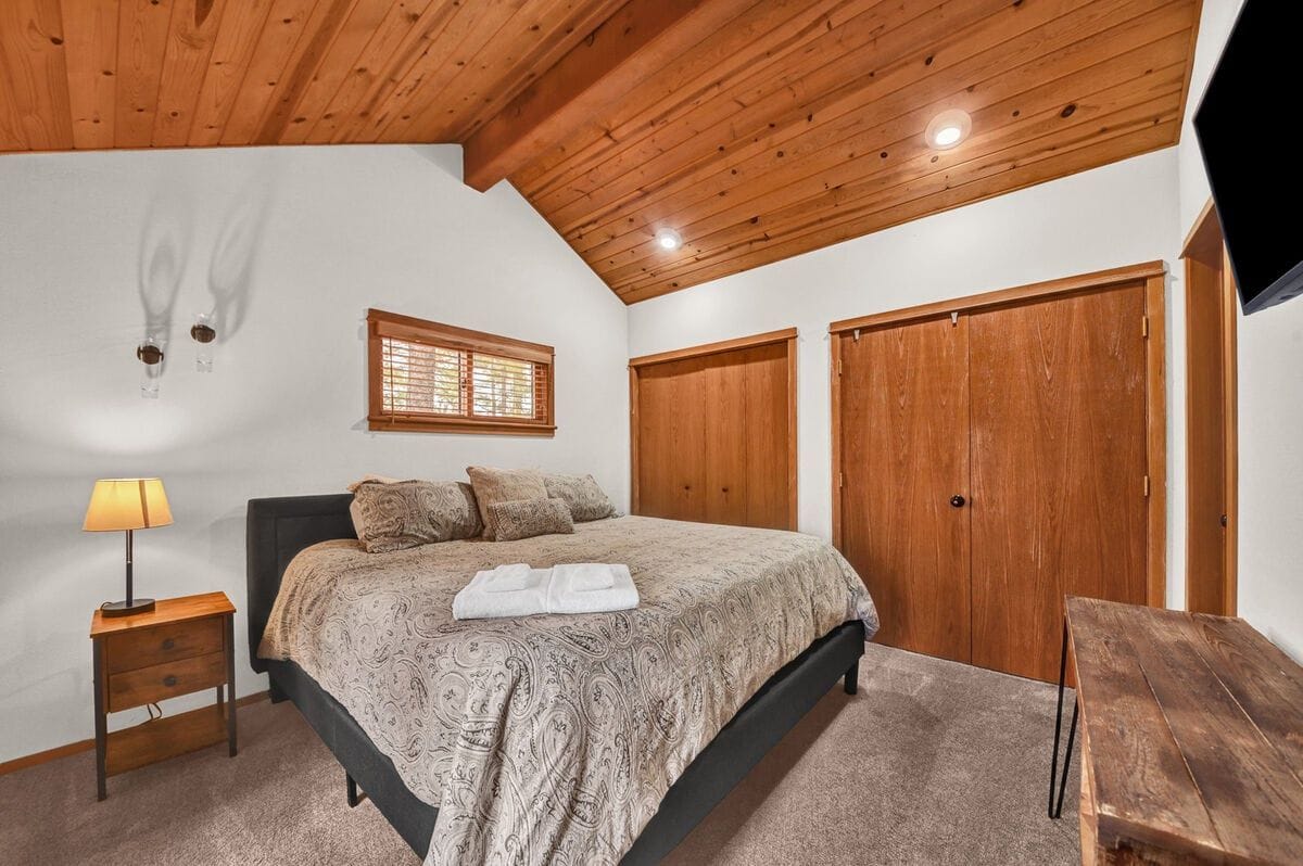 Cozy bedroom with wood accents.