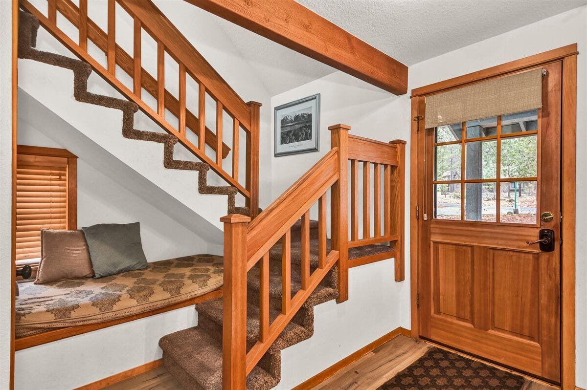 Wooden stairs and door entrance.