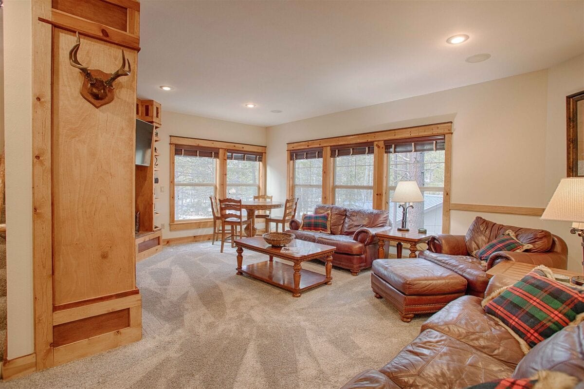 Cozy living room with leather furniture.