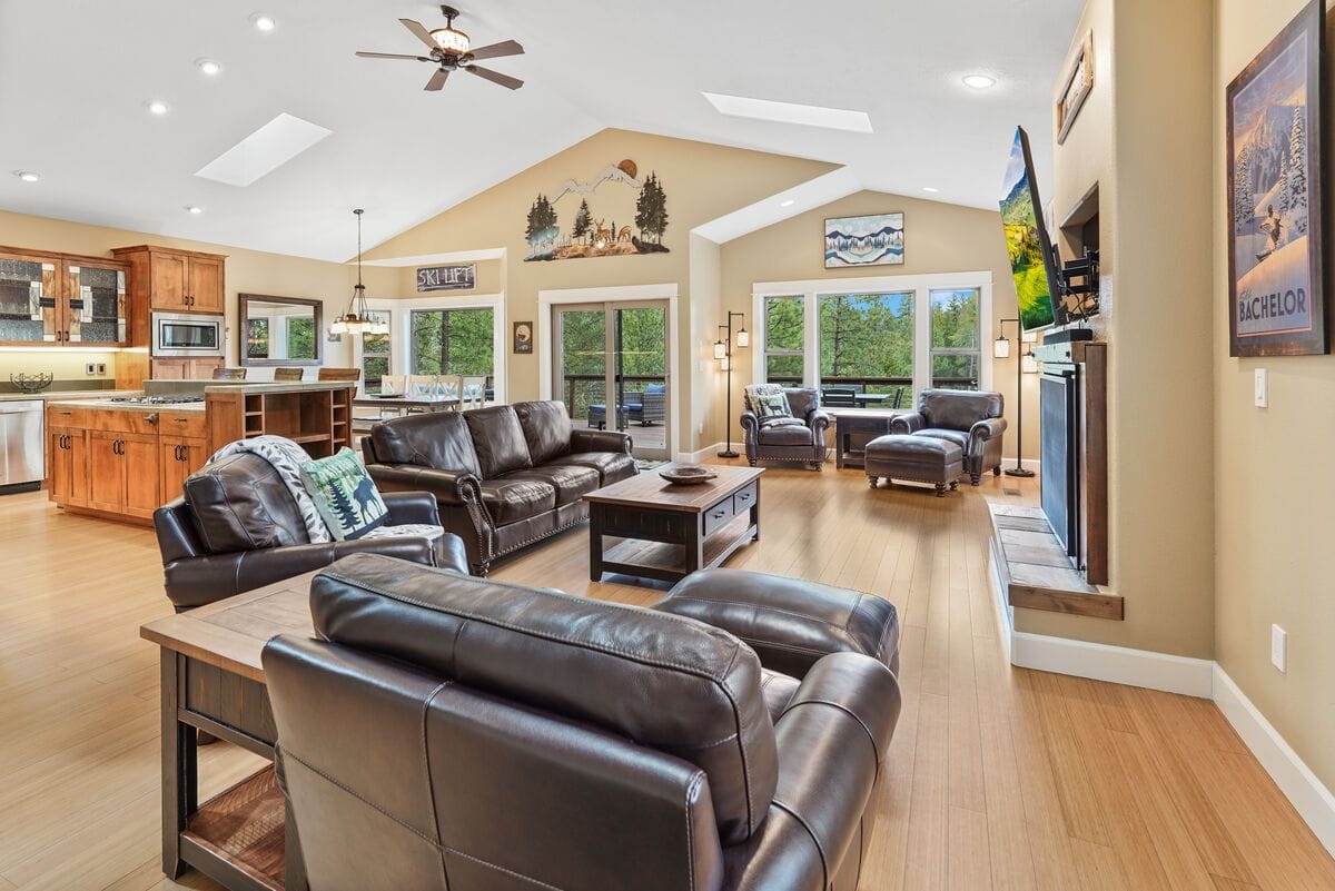 Spacious living room with leather furniture.