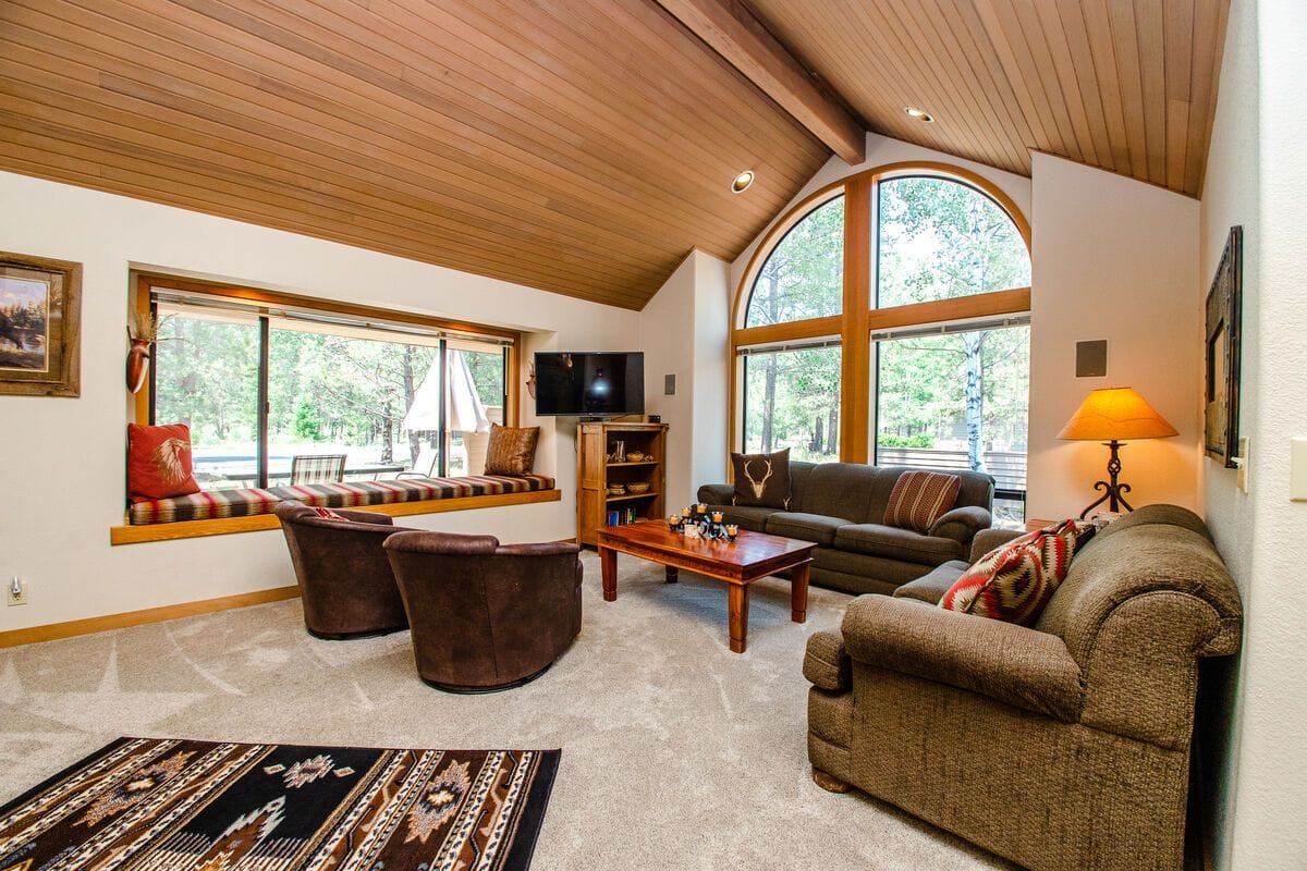 Cozy living room with large windows.