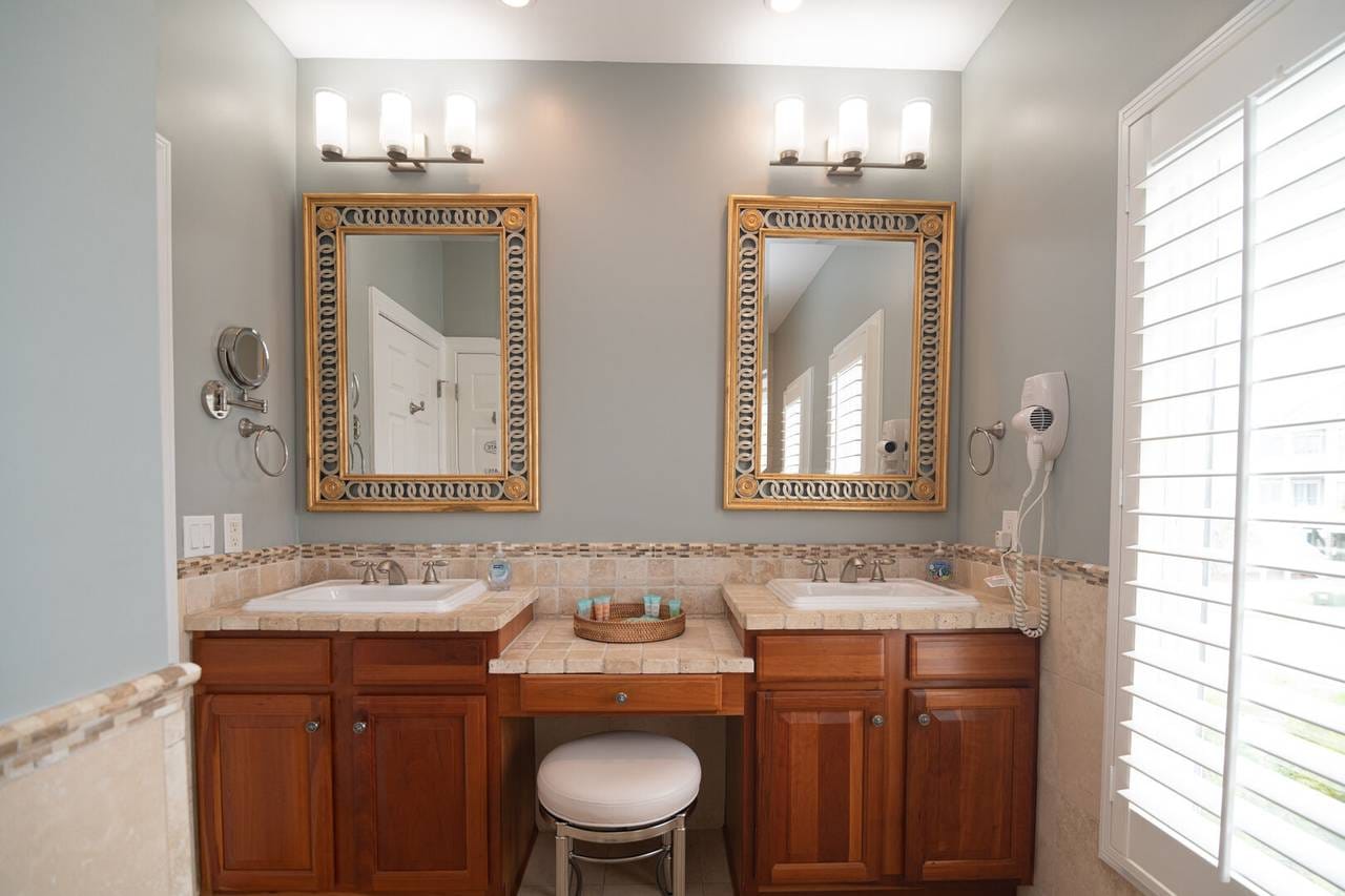 Elegant double bathroom vanity setup.