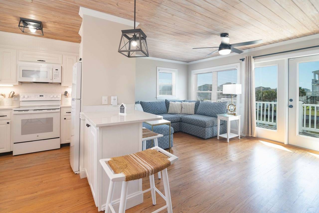 Bright living room and kitchen area.