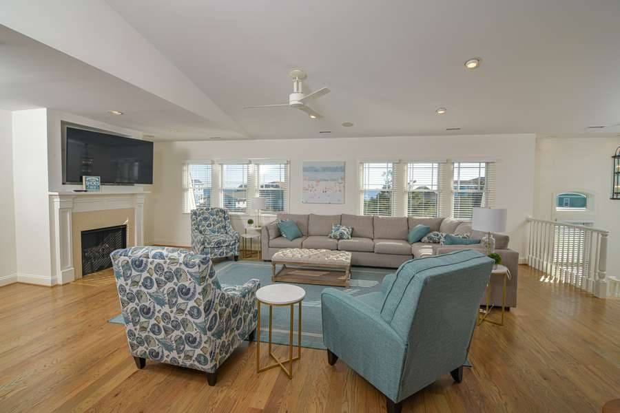 Spacious living room with furniture.