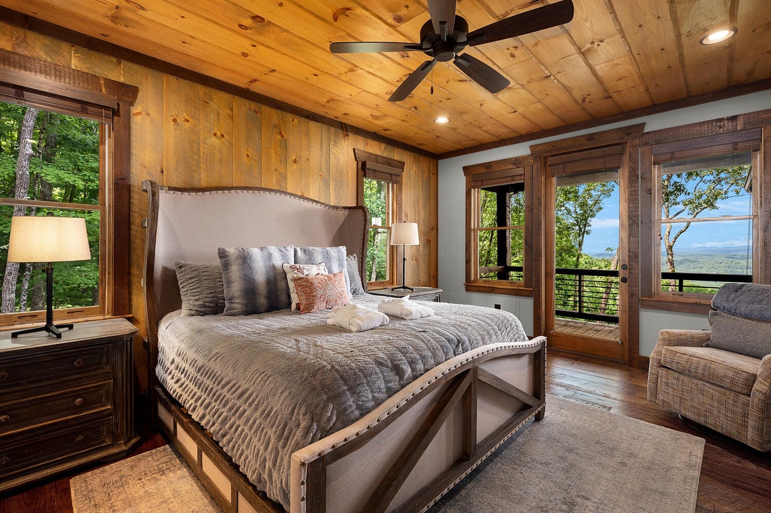 Rustic bedroom with scenic view.