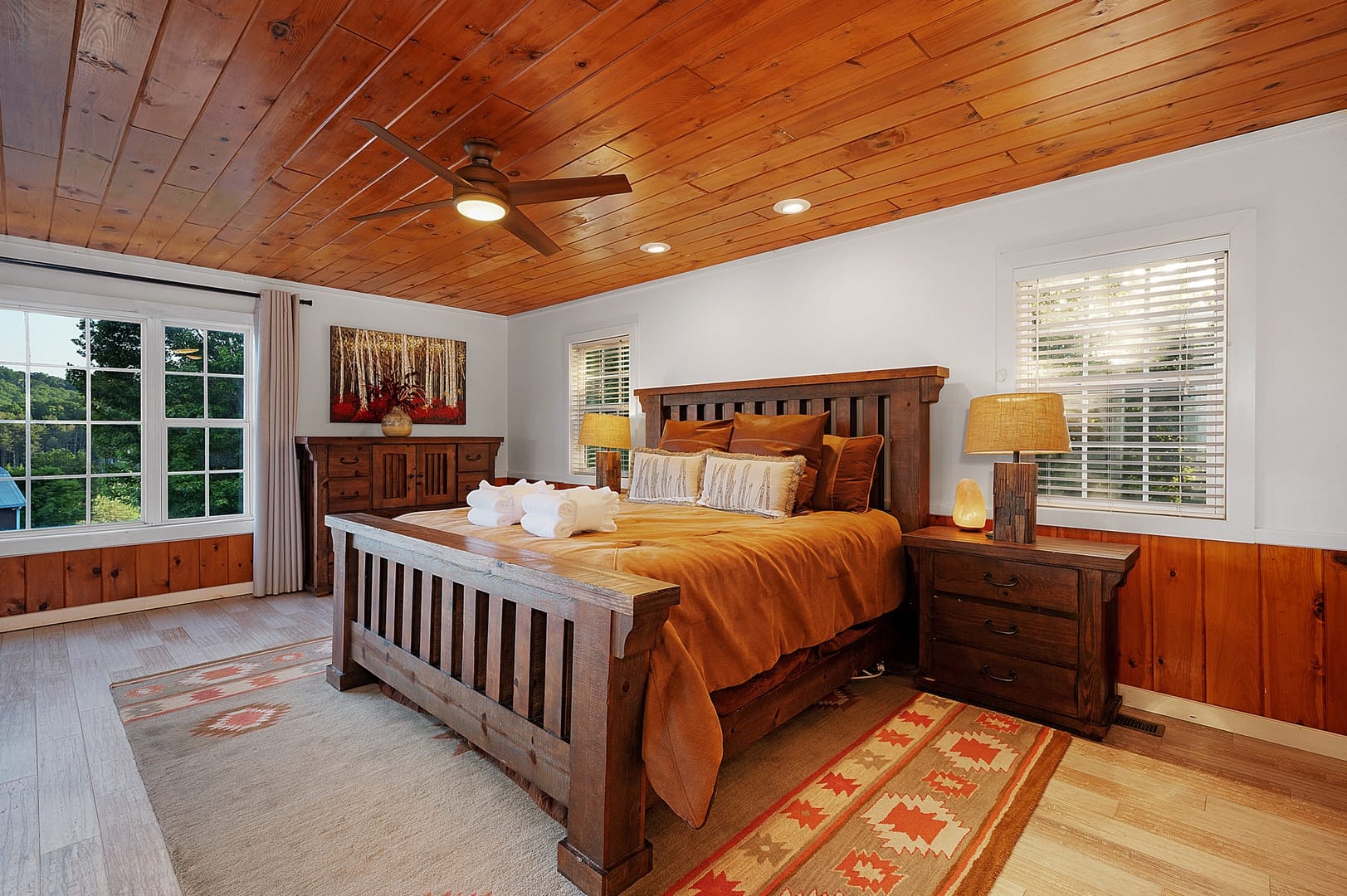 Rustic bedroom with wooden furniture.