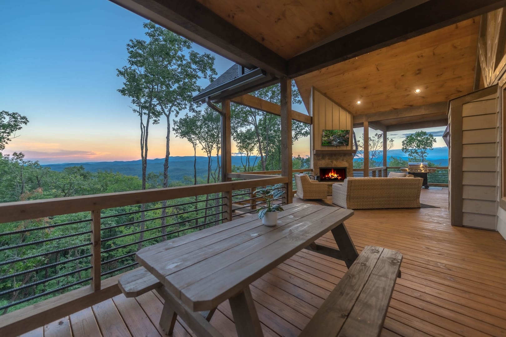 Cozy deck with outdoor fireplace.