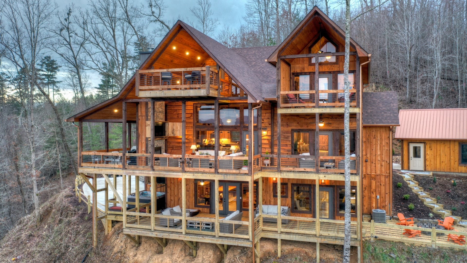 Rustic multilevel wooden cabin exterior.