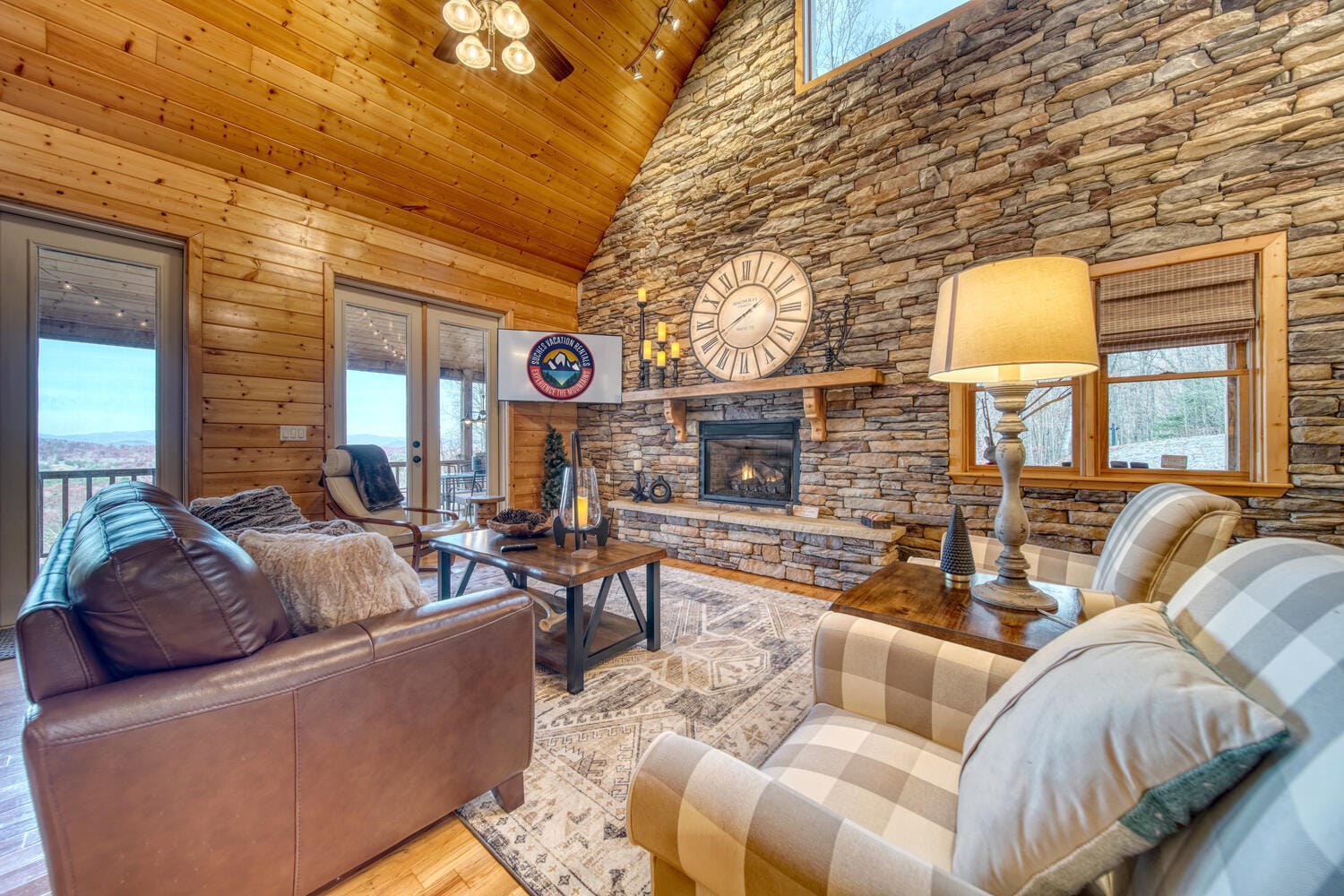 Cozy cabin living room with fireplace.