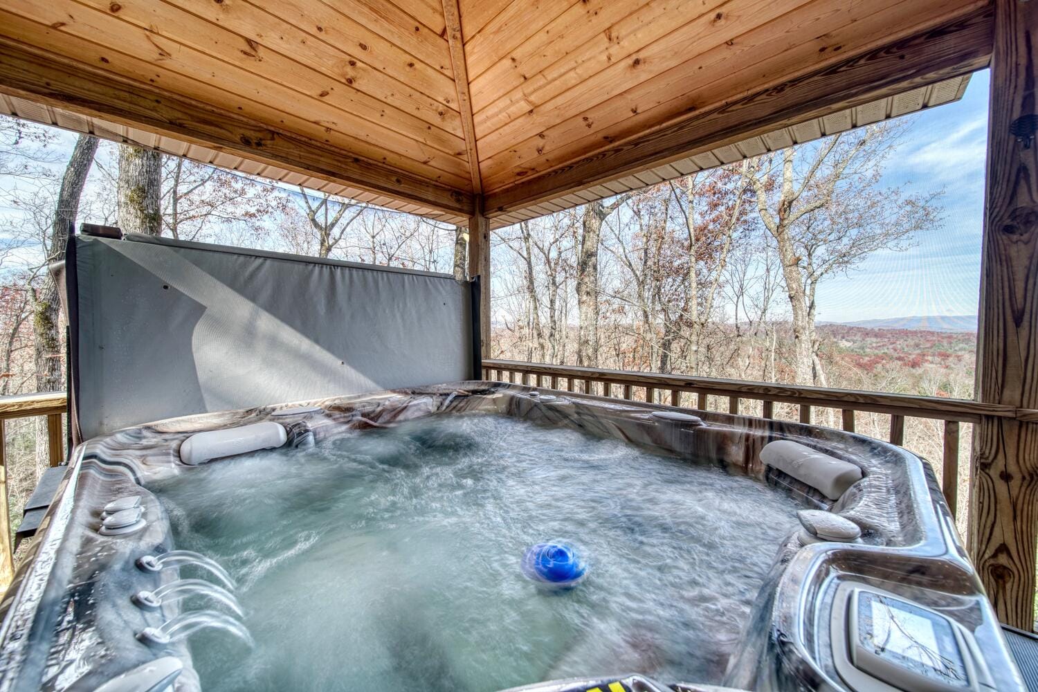 Hot tub on covered deck.