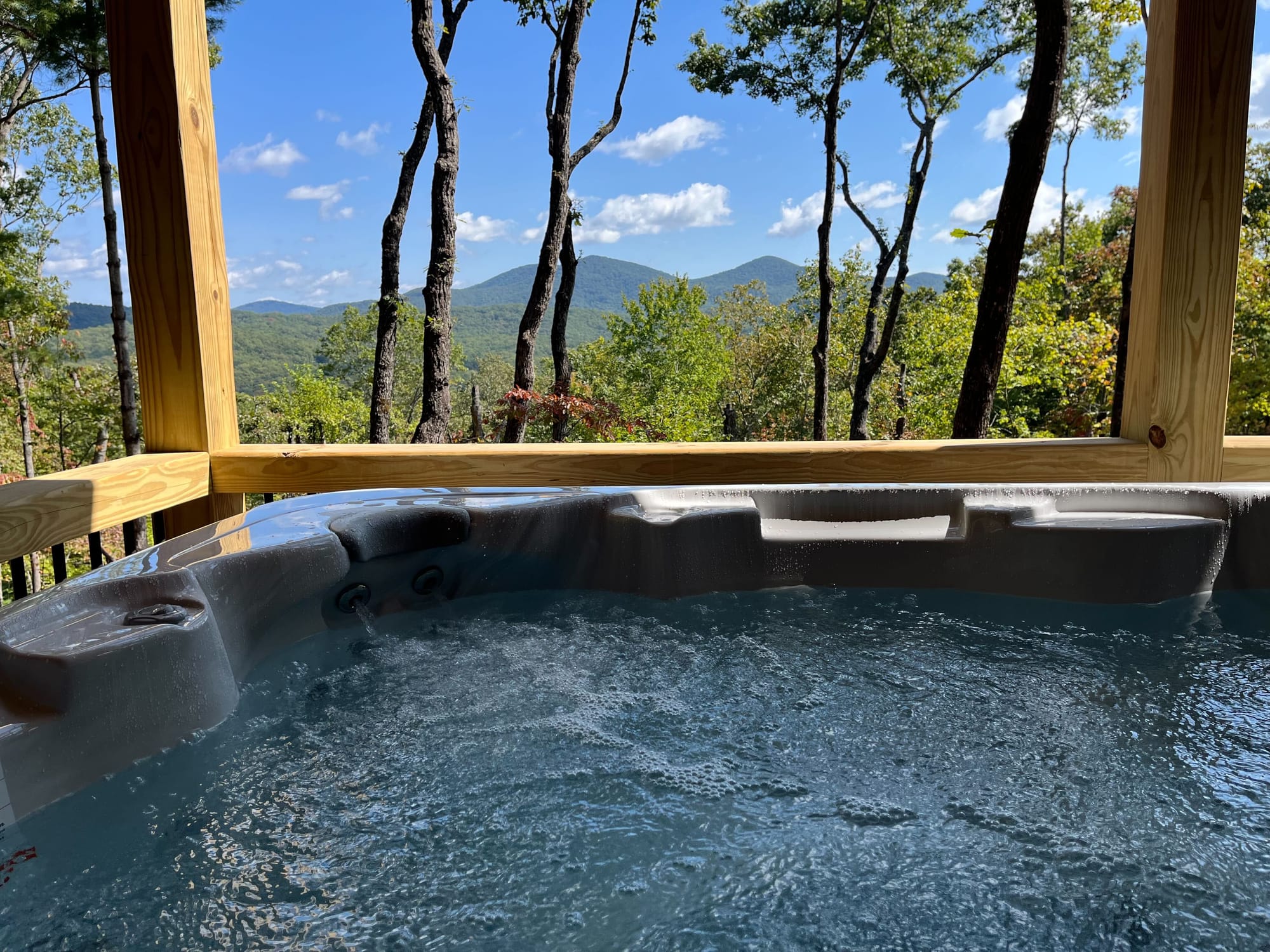 Hot tub with mountain view.