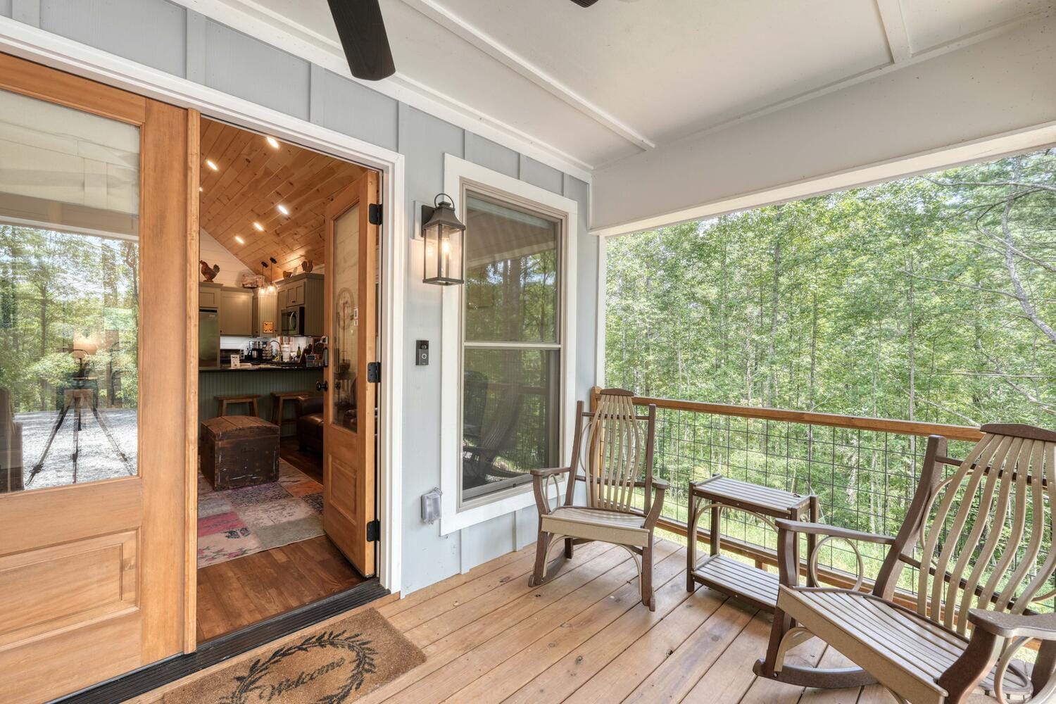 Cozy porch with two chairs.