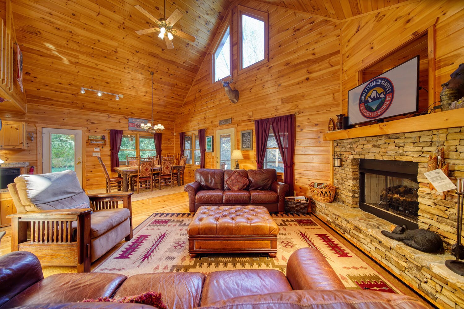 Cozy cabin interior with fireplace.