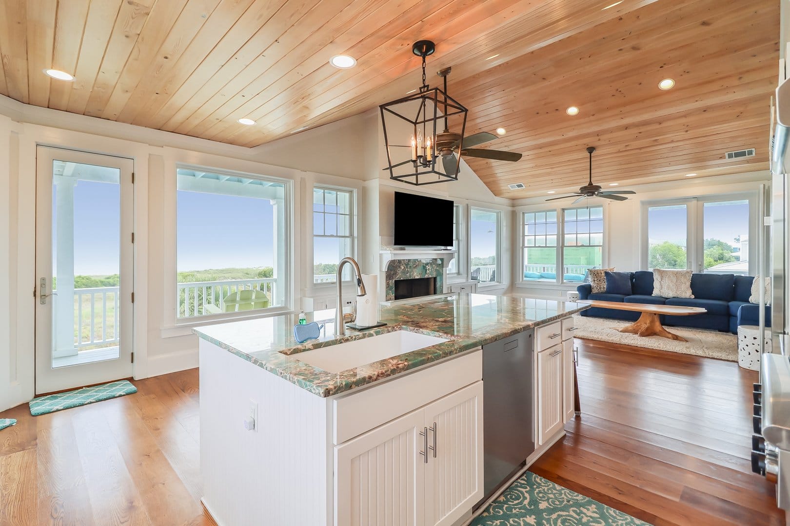 Bright kitchen and living room view.