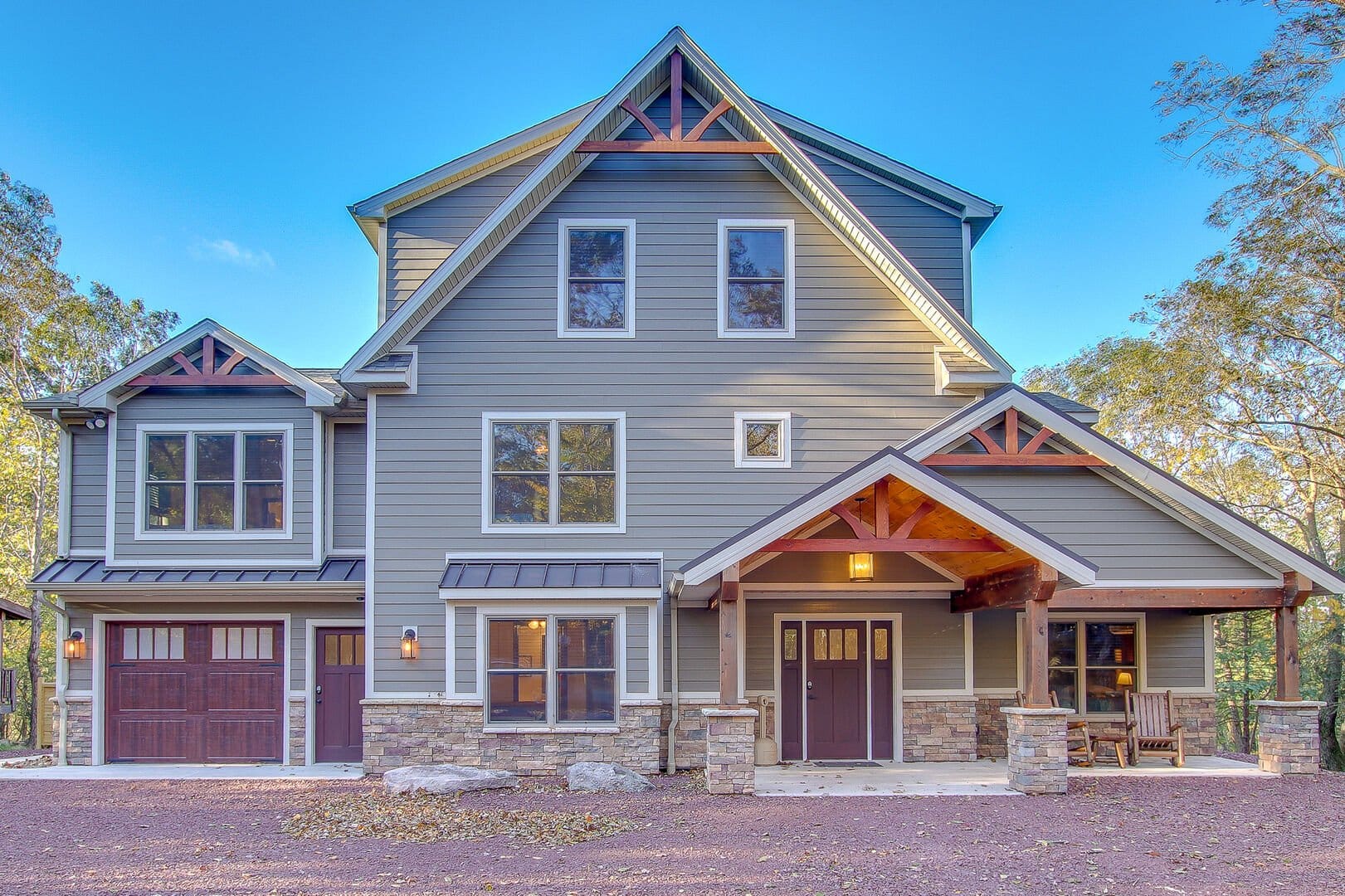 Modern two-story house, wooden accents.