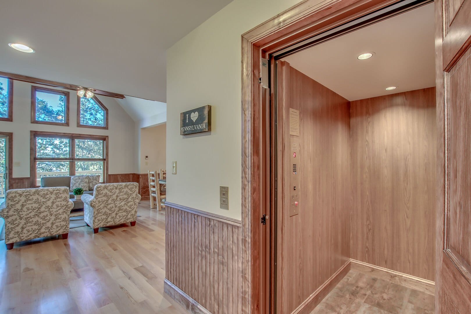 Home interior with open elevator.