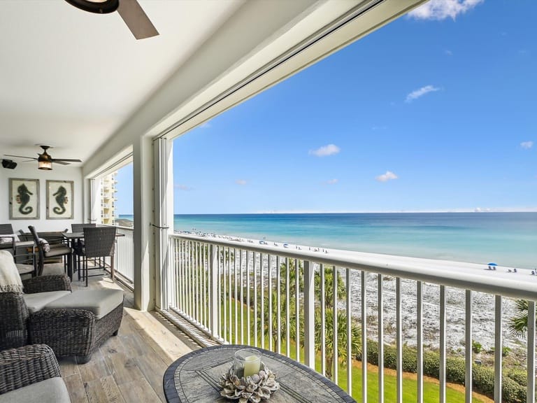 Balcony overlooking beach and ocean.