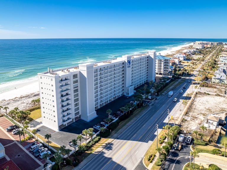 Beachfront hotel and scenic coastline.