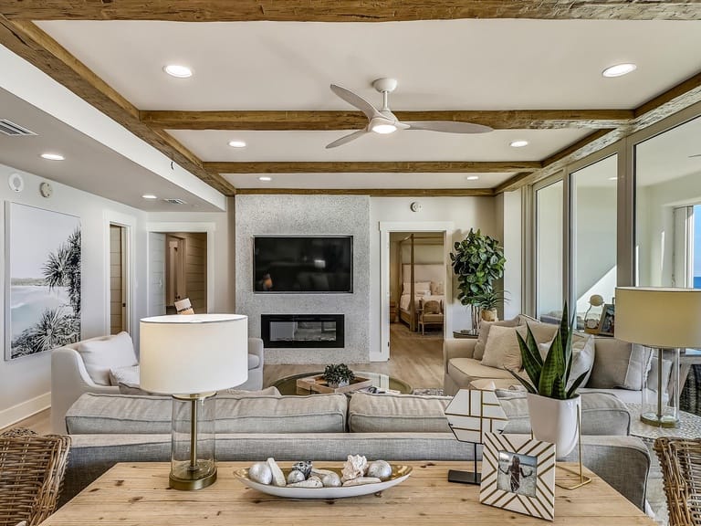 Modern living room with ceiling beams.