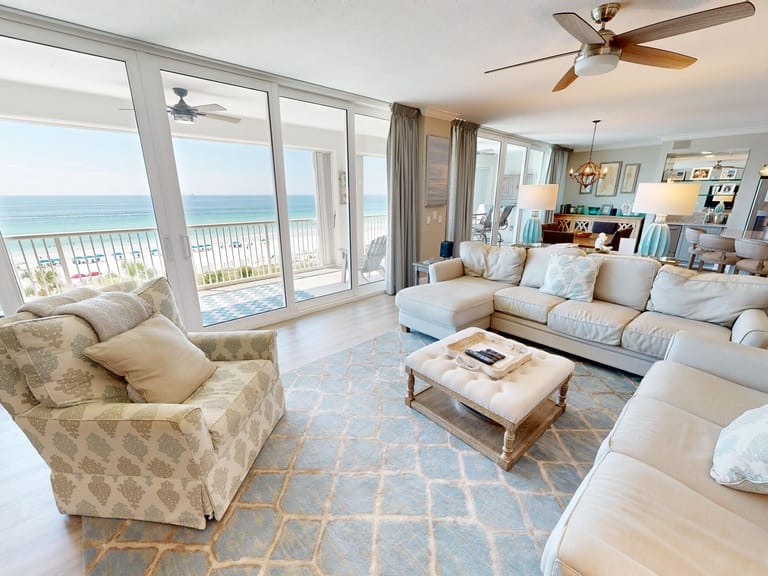 Beachfront living room with ocean view.