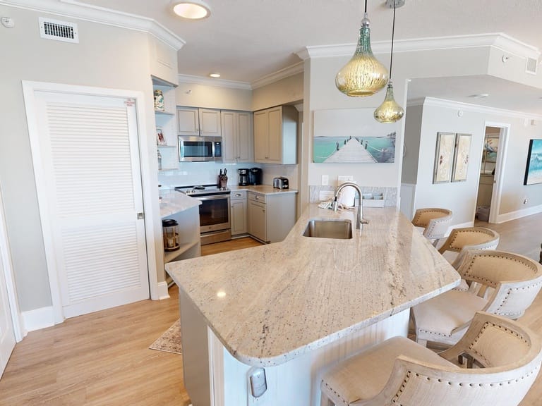 Modern kitchen with island seating.