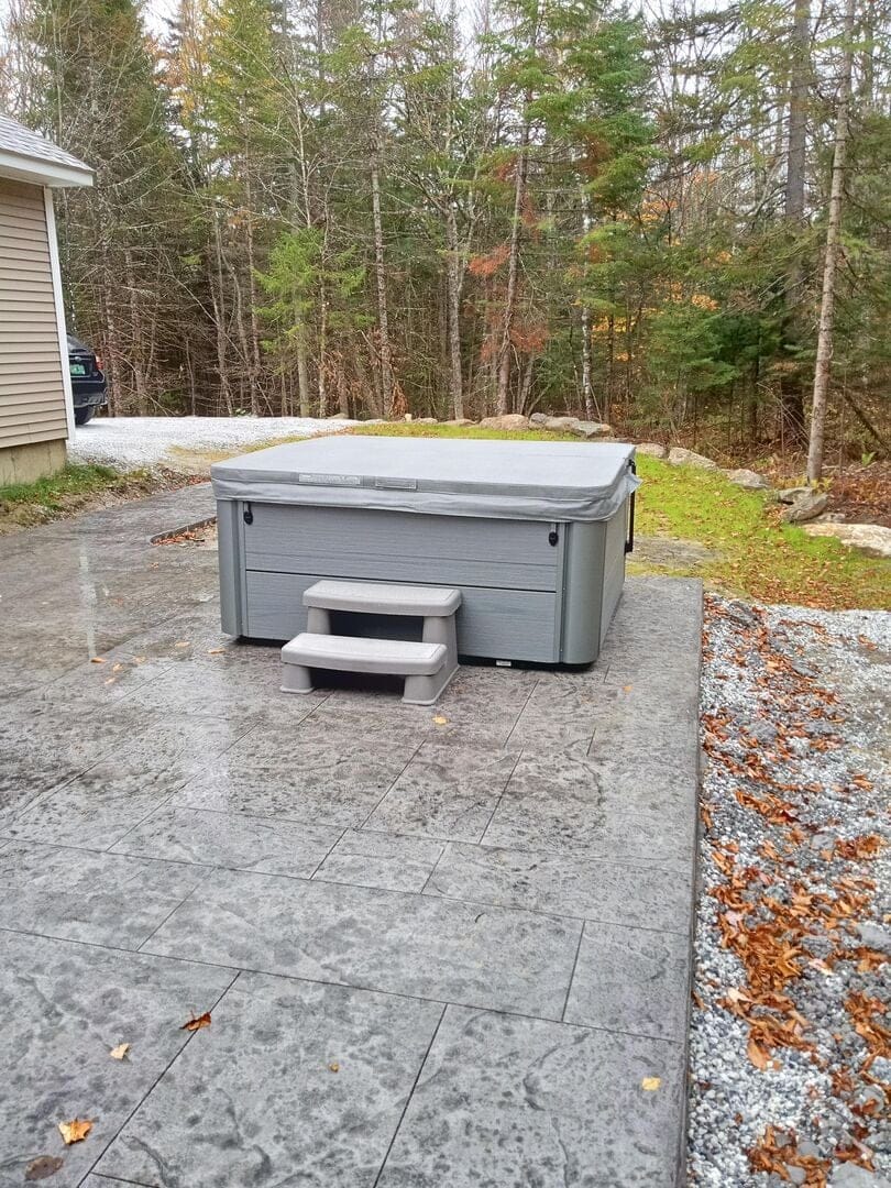 Hot tub on a patio.