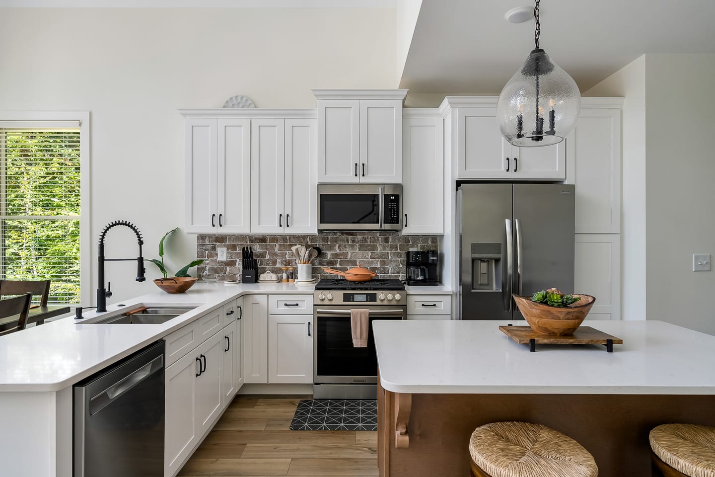 Modern kitchen with white cabinets.