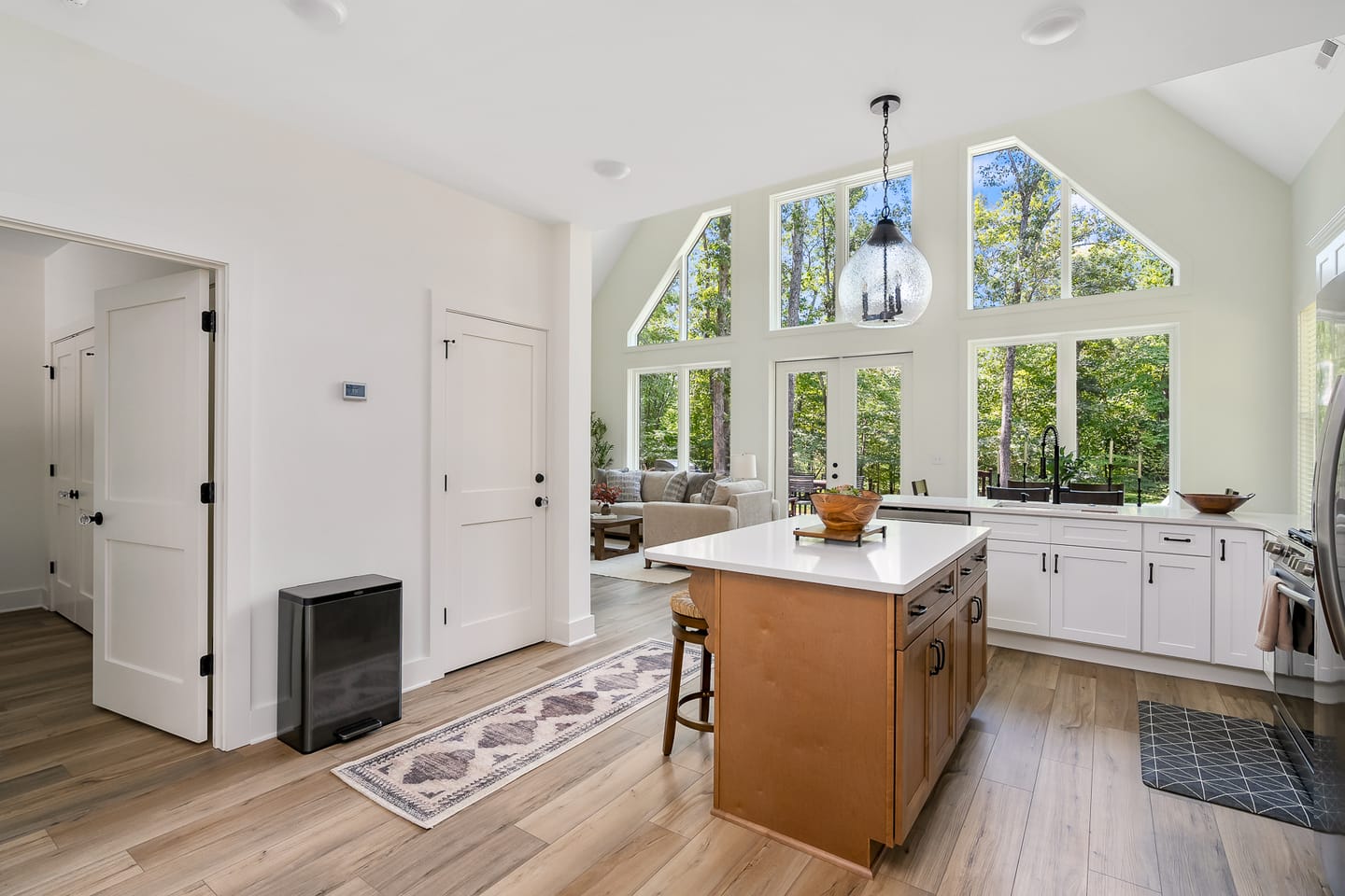 Bright kitchen with large windows.