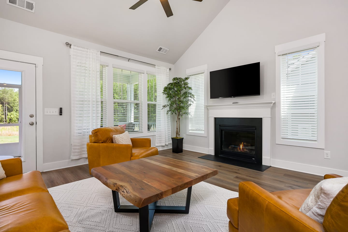 Modern living room with fireplace.