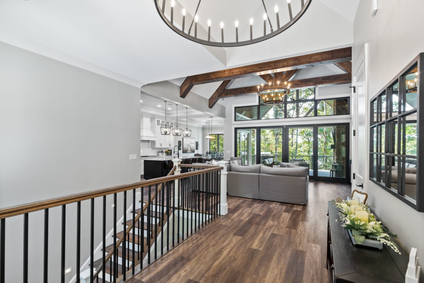 Modern open-concept living room, kitchen.