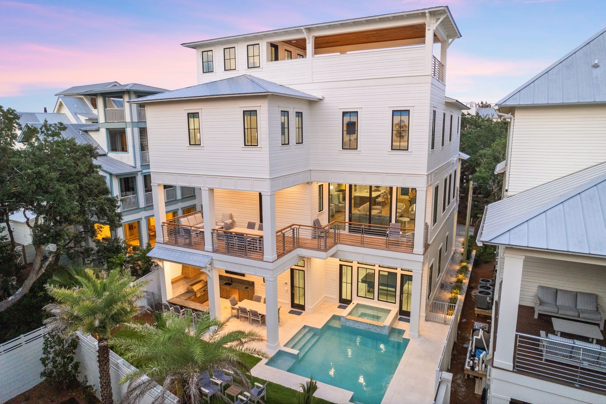 Three-story house with swimming pool.