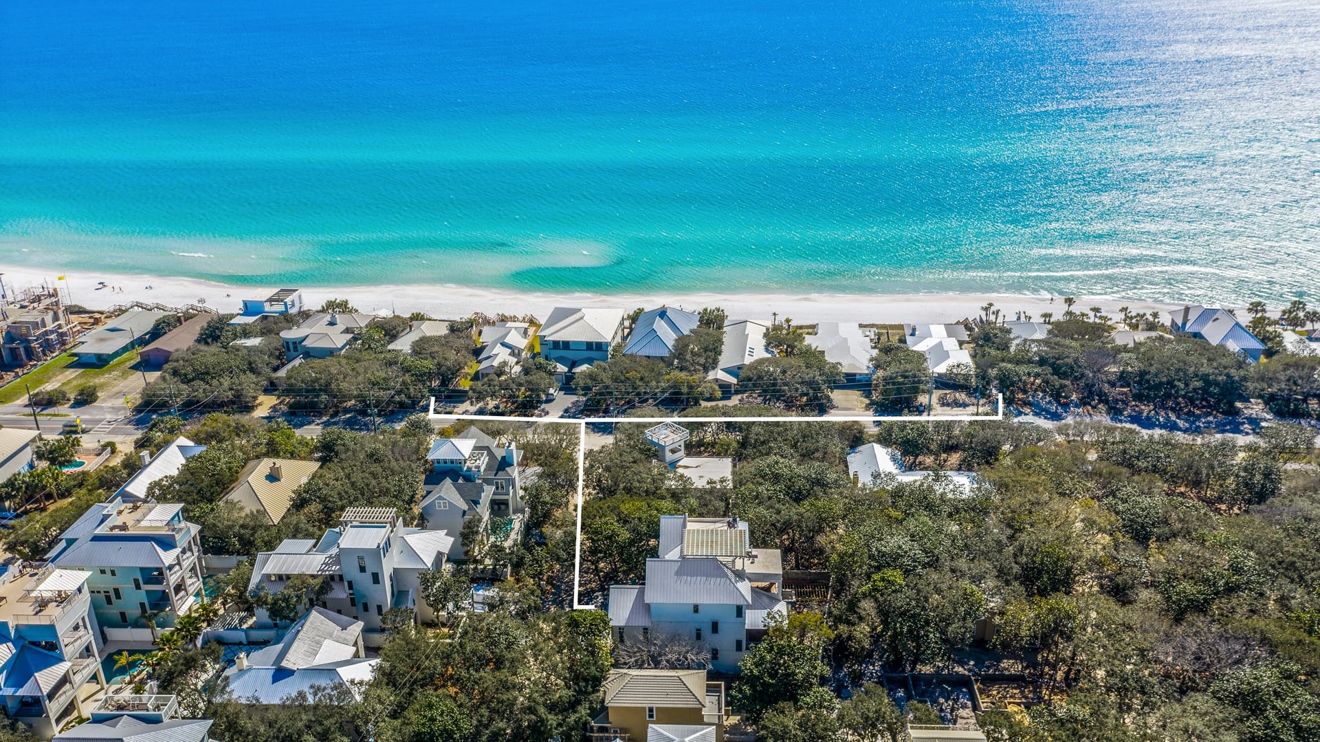 Aerial view of coastal neighborhood.