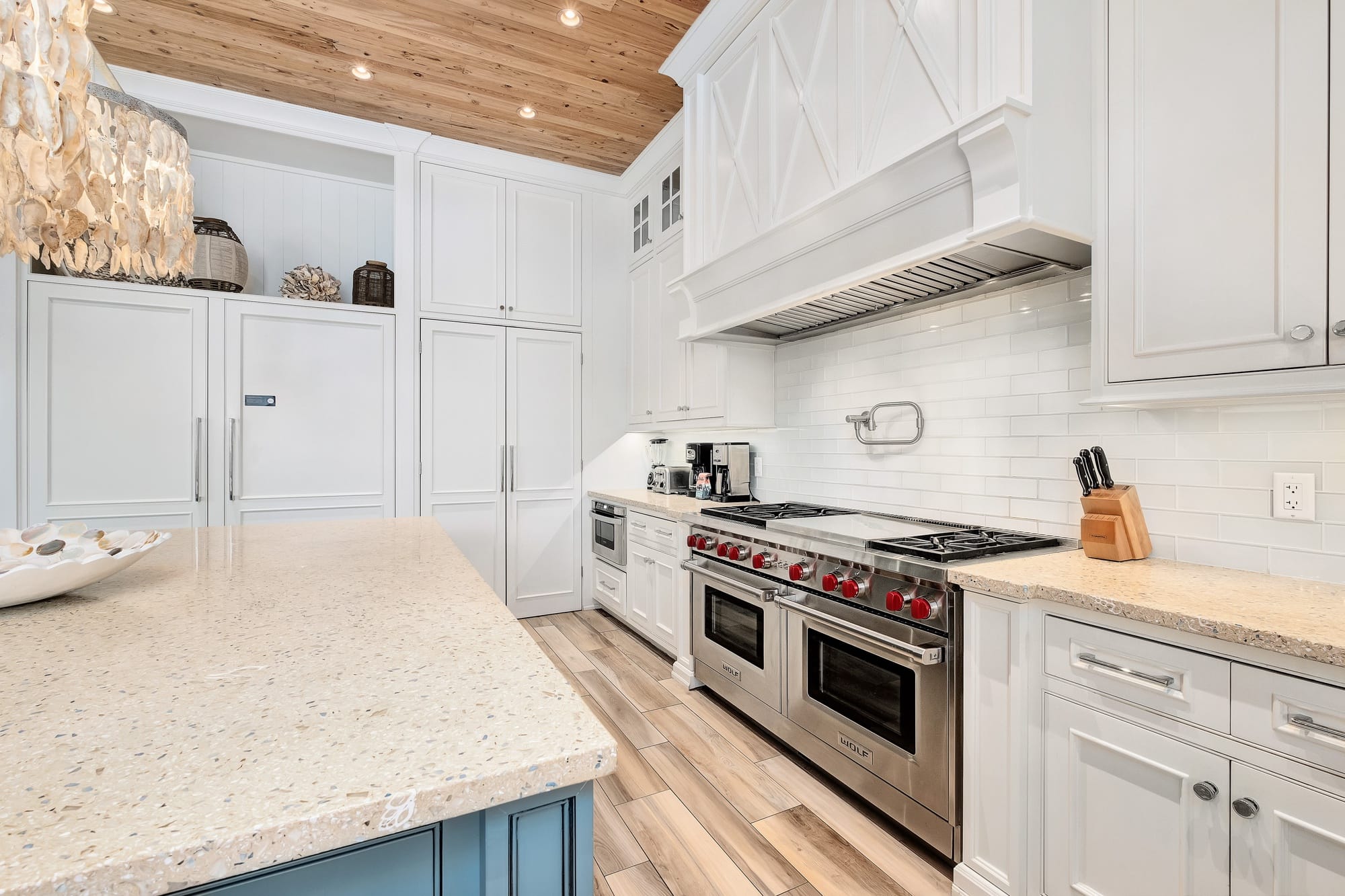 Modern kitchen with white cabinetry.