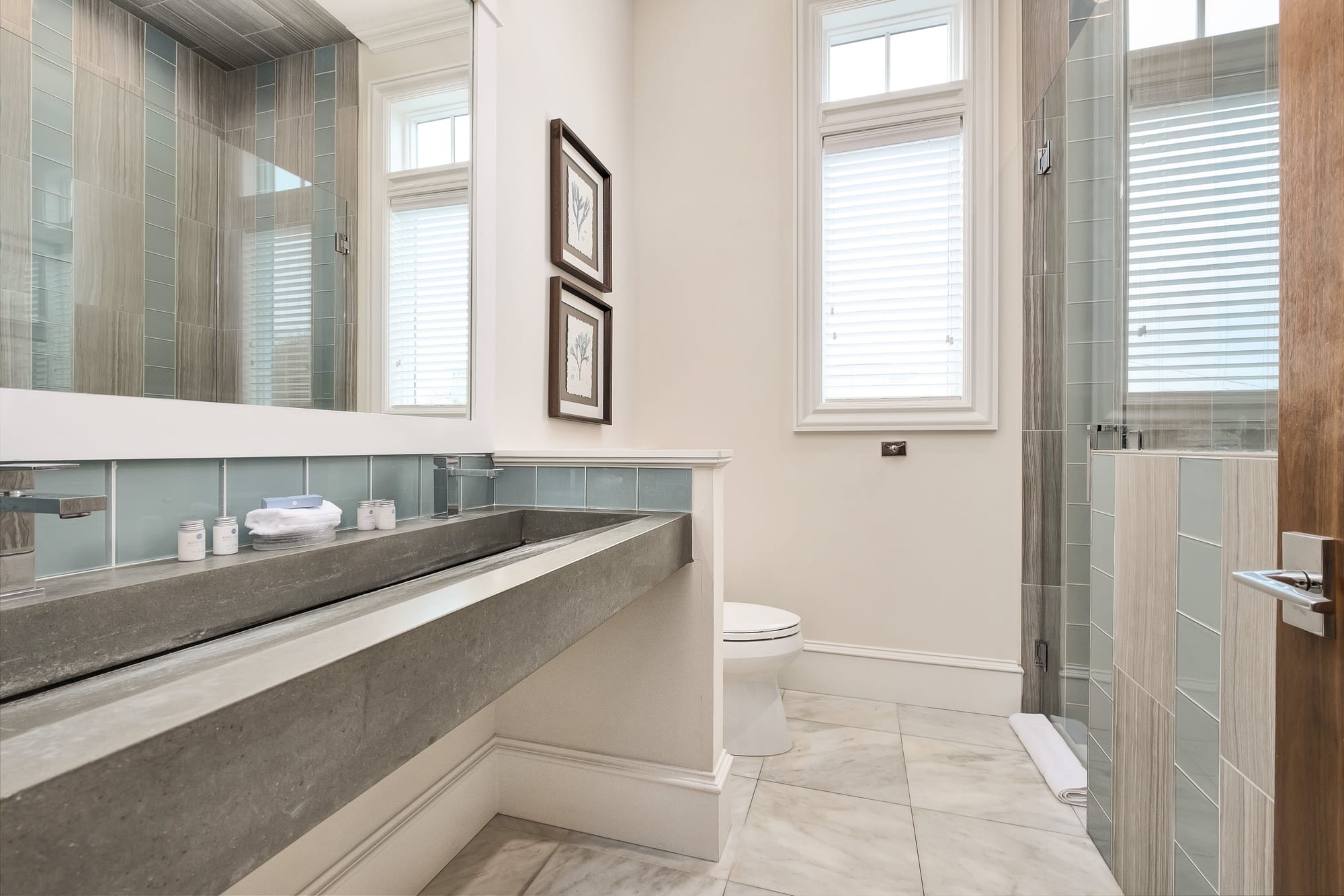 Modern bathroom interior with glass shower.