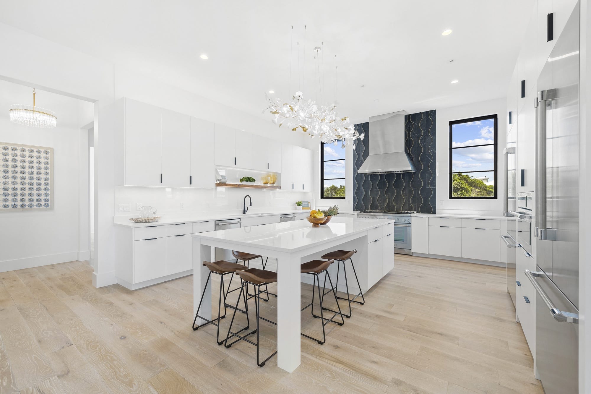 Modern white kitchen with island.