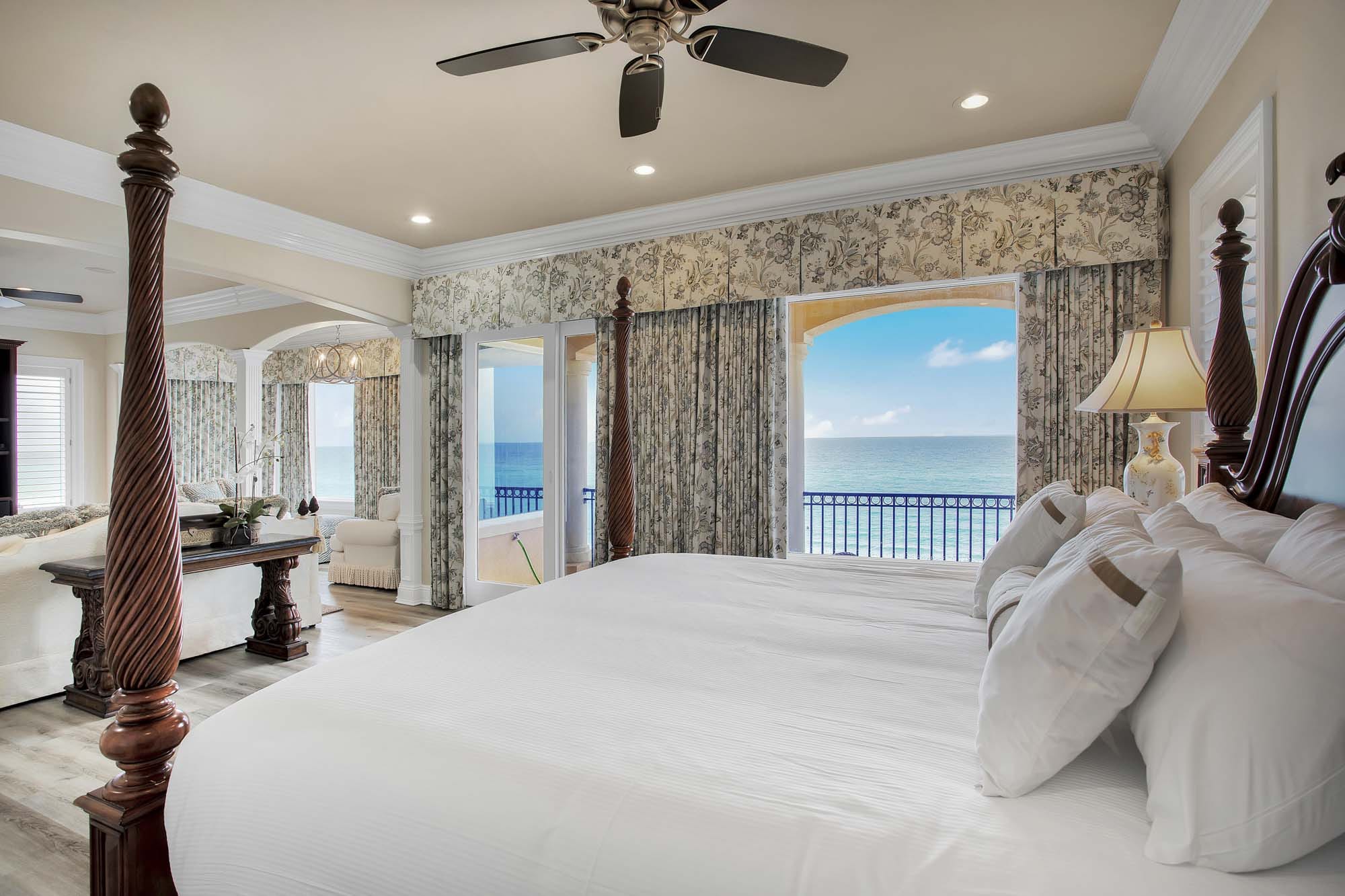 Luxurious bedroom with ocean view.