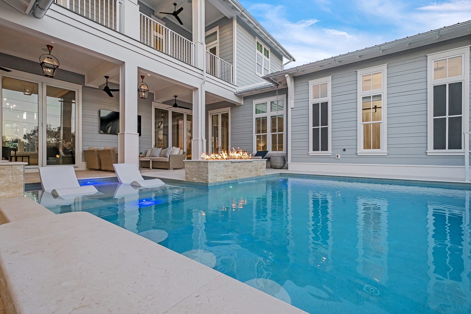 Modern house with pool and patio.